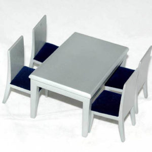 Silver table with 4 navy blue seated chairs