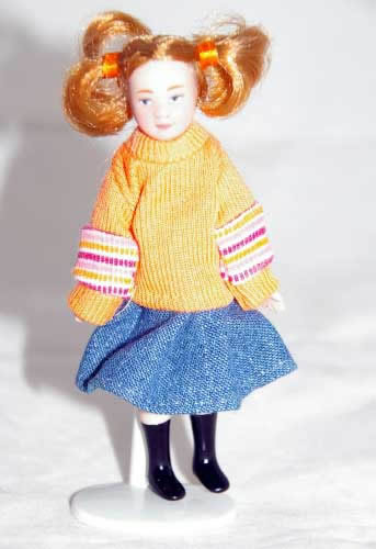 Girl doll pink  jumper & piggy tails Colour change