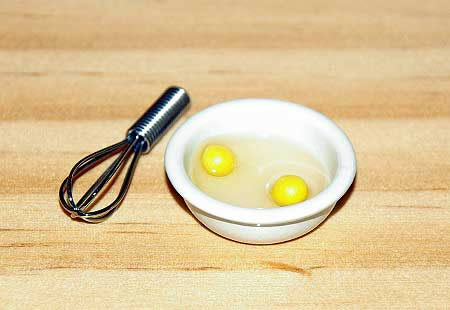 Eggs in bowl with beater