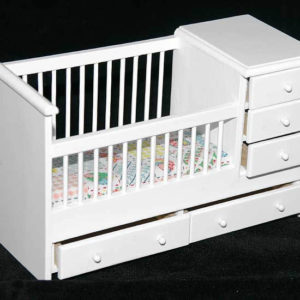 White cot with drawers