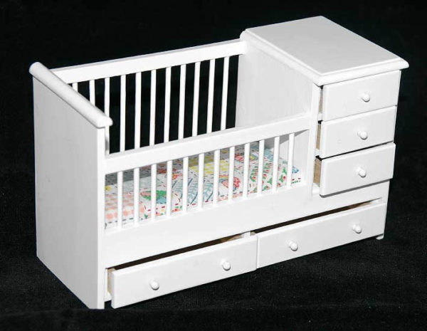 White cot with drawers