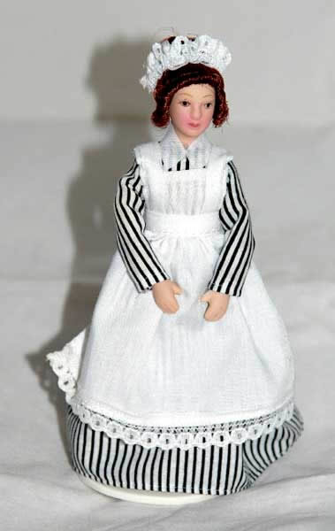thumbnail image 2 of Town Square Miniatures 1:12 Scale Porcelain Victorian Maid Doll With Green Striped Dress G7619 2 of 5