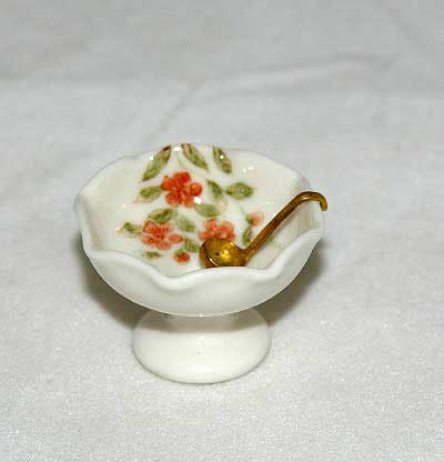Punch bowl and gold serving spoon, porcelain