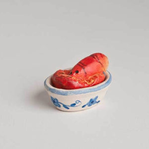 Lobster topped tureen dish