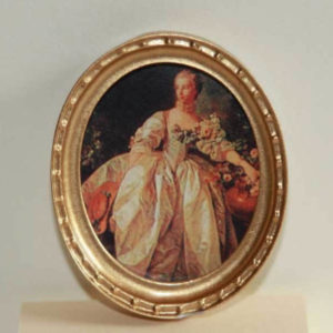 Gold small oval picture of lady