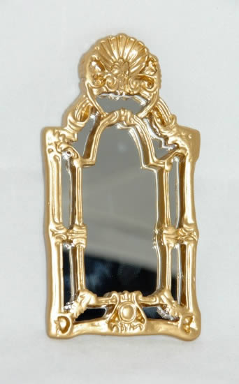 Gold mirror with detailed frame