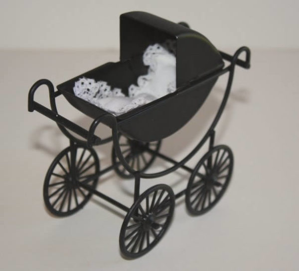 Old fashioned pram, black with bedding