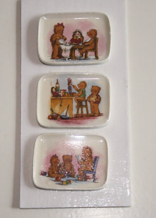 Set of three teddy decorated plates