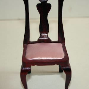 Mahogany chair with pink silk seat