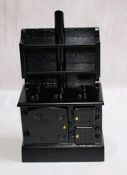 Black timber stove with flu