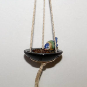 Ceramic hanging bird bath or feeder with bird